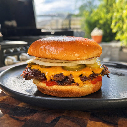 Diamond R smash burgers with crispy lacy edges and melted cheese on toasted buns