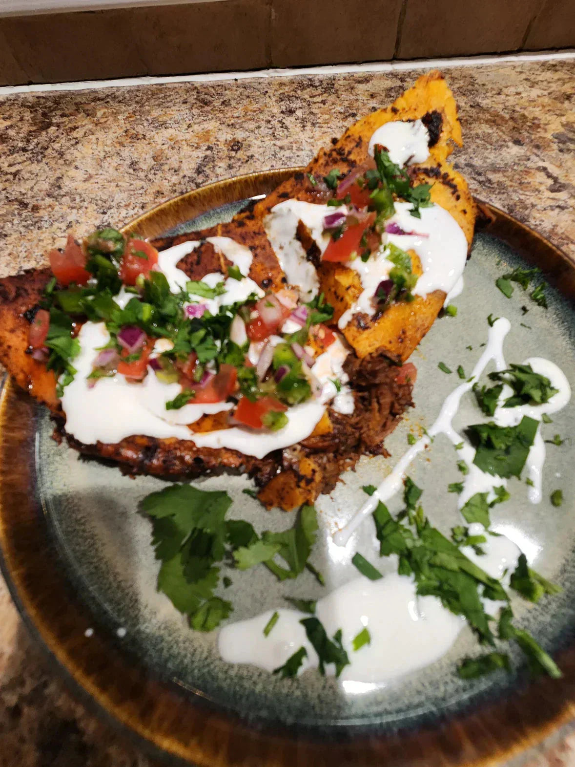 Crispy, cheesy Diamond R birria tacos made with slow-cooked chuck roast, served with consomme for dipping